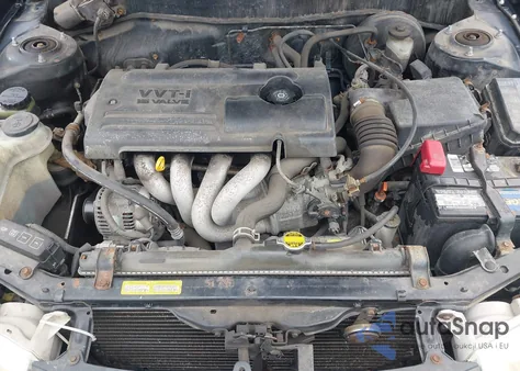 2002 Toyota Corolla Ce из США, поврежденный, VIN 2T1BR12E92C521983